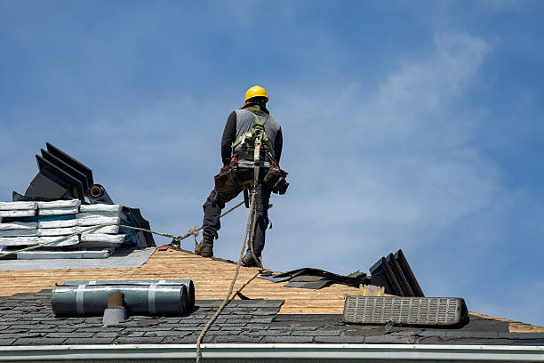 Professional Roof Replacement technician working in Earth City, MO
